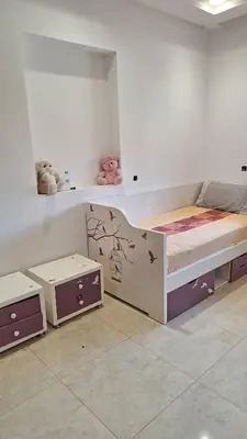 a bedroom with a bed and two stuffed animals at Exclusive Luxury Suite in Rabat City Center in Rabat