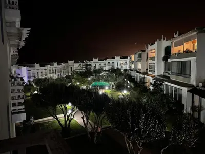 a view of a city at night with buildings at Luxury Sea View in Tamaris