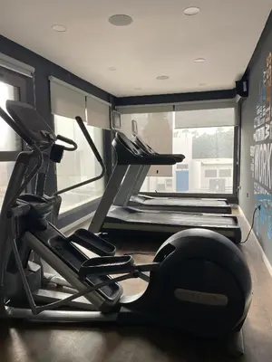 a gym with two treadmills and a treadmill at M'ocean Sea View Apartment by 7AV Hotels in Mohammedia