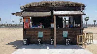 a kiosk in the desert with a person inside at Appartement casa bay sidi rahel in Sidi Rahal