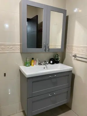 a bathroom with a sink and a mirror at Beach palace 1 between sea pool and city center in Mohammedia