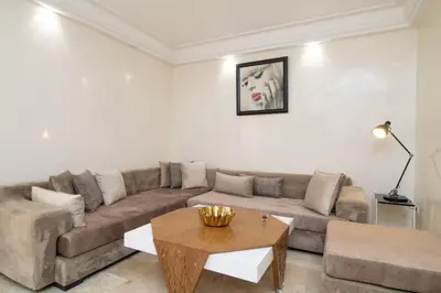 a living room with a couch and a table at Anfa Dream in Casablanca