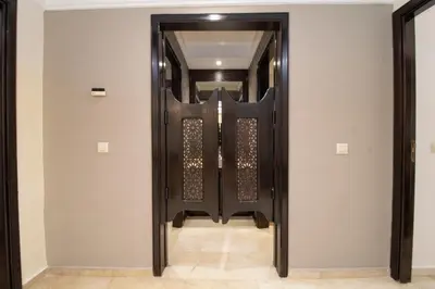 a door in a room with a mirror at Anfa Dream in Casablanca