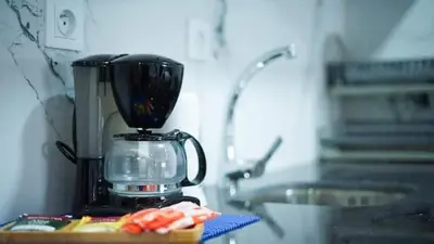 a blender sitting on a counter next to a sink at Luxe Bleu Studio Rabat in Rabat