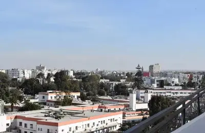 a view of a city from a balcony at Elegant Apartment with City View in Casablanca