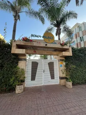 a garage with a sign on top of it at Apartment with sea view in Mohammedia