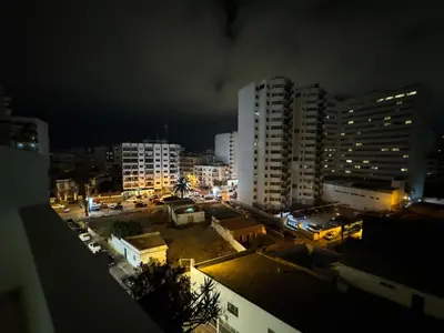 a view of a city at night with buildings at Luxury 3 Bedroom Apartment Panoramic Terrace View in Casablanca