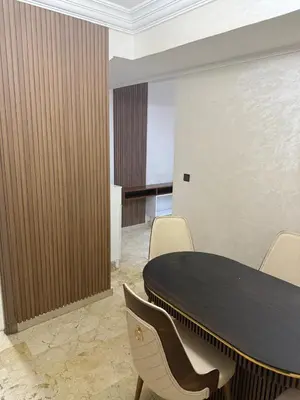 a conference room with a black table and chairs at Chic house living in Casablanca