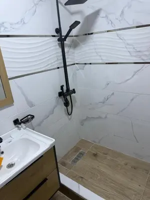 a bathroom with a shower and a sink at Chic house living in Casablanca