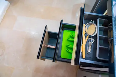 a open drawer with a green container and scissors at R102-3-4 Amazing apartments in Belvedere with Breathtaking Ocean and Street Views in Casablanca