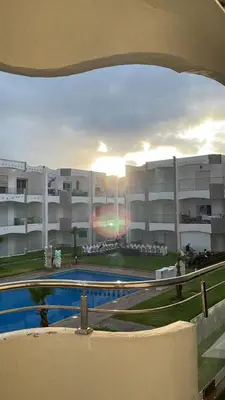 a view of a large apartment building with a swimming pool at Appartement à Ritaj Beach in Casablanca