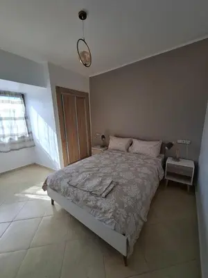 a bedroom with a large bed in a room at Apt 3 ch Casablanca 3 min Casa Voyageurs idéal pour une famille in Casablanca