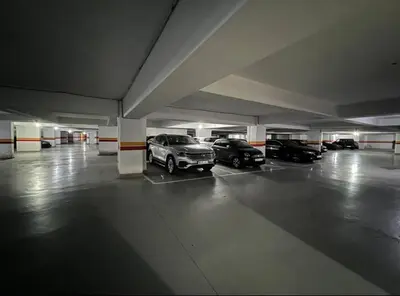 a parking garage with several cars parked in it at Le yacht luxury apartment 2BR 2BA corniche with parking in Casablanca
