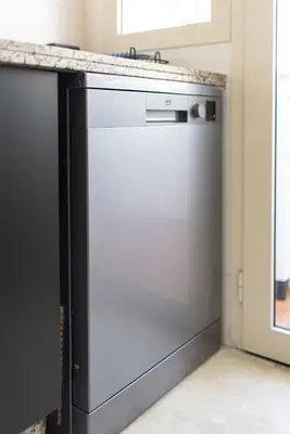 a stainless steel dishwasher in a kitchen at Luxury 2BR Apartment City Center with Parking in Casablanca