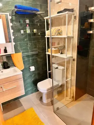 a bathroom with a toilet and a shower at Le mataki in Mohammedia