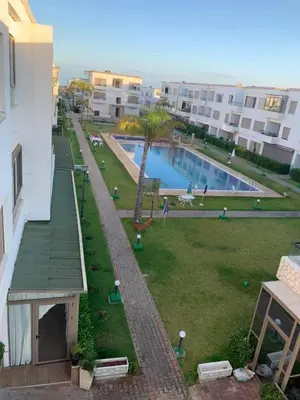 a view of a swimming pool from a building at Puerto banus appartement in Mohammedia