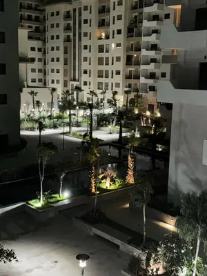 an aerial view of a city at night at Ocean Park Apartment for rent in Casablanca