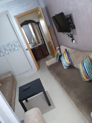 an overhead view of a living room with a couch and a table at Blanca beach in Casablanca