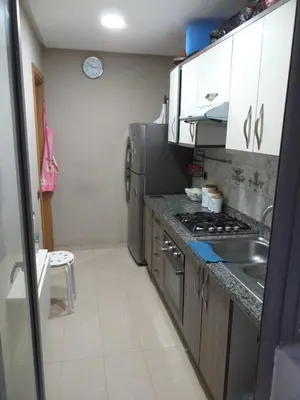 a kitchen with a stainless steel refrigerator and a sink at Blanca beach in Casablanca