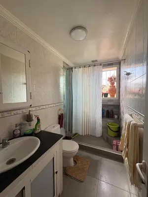 a bathroom with a sink and a toilet and a shower at 2 Bedroom APT Near downtown - Perfect Location in Casablanca