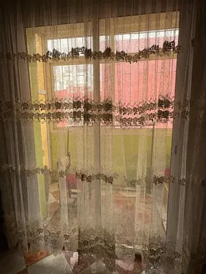 a window with curtains in a room at 2 Bedroom APT Near downtown - Perfect Location in Casablanca