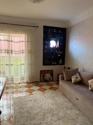 a living room with a couch and a tv at 2 Bedroom APT Near downtown - Perfect Location in Casablanca