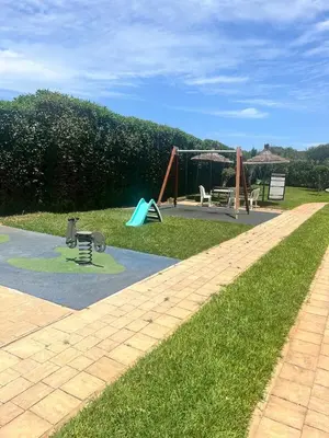 a park with a playground with at Appartement Cosy & Calme avec Piscine, Tamaris Dar Bouazza in Tamaris