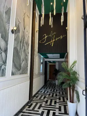 a hallway with a sign that reads drift house at Cosy Studio Plein Casablanca in Casablanca