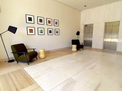 a room with chairs and pictures on a wall at Casa Tina in Casablanca