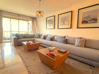 a living room with a couch and a table at Casa Sahifa in Casablanca