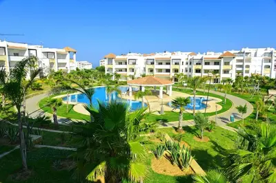 an aerial view of a resort with a swimming pool at Unité dans un complexe prestigieux Marina Golf in Settat