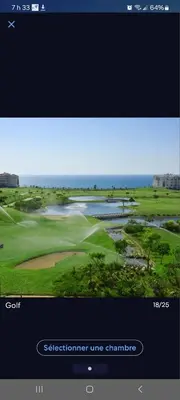 a computer screen with a picture of a golf course at Unité dans un complexe prestigieux Marina Golf in Settat