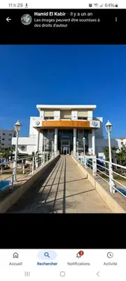 a building with a walkway in front of it at Unité dans un complexe prestigieux Marina Golf in Settat
