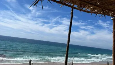 a view of the ocean from a beach at Bel appartement centre Asilah proche de la mer in Aïn Harrouda