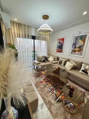 a living room with a couch and a table at Morostay in Casablanca