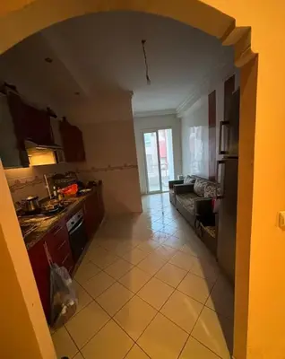 a view of a kitchen with a large room at Appartement sidi rehal l'ocean in Sidi Rahal