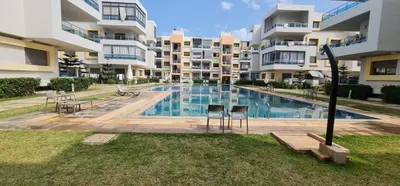 an image of a swimming pool in a apartment building at El Mansouria Mohammedia Casablanca in Pont Blondin