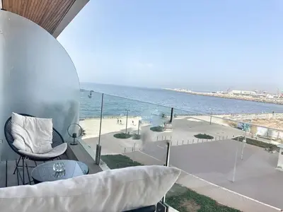 a living room with a view of the ocean at Ocean Dream in Casablanca