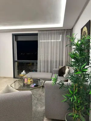a living room with two couches and a glass table at Business Travel - Luxury 1 BD Flat - Casablanca Finance City in Casablanca