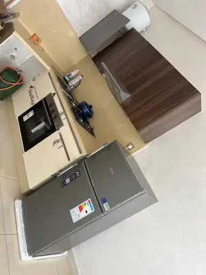 an overhead view of a kitchen with a refrigerator at Costa house in Bouznika