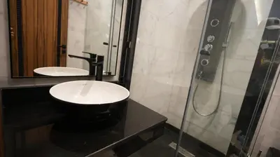a bathroom with a sink and a shower at Central Quiet Spot in Casablanca