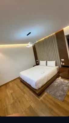 a bedroom with a large bed in a room at ghaouat luxury appart in Casablanca
