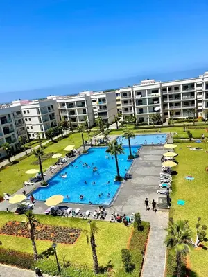 an aerial view of a resort with a large pool at Appartement à louer à Bouznika avec piscine in Bouznika