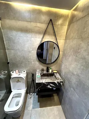 a bathroom with a sink and a mirror at Studio au Cœur de Rabat in Rabat