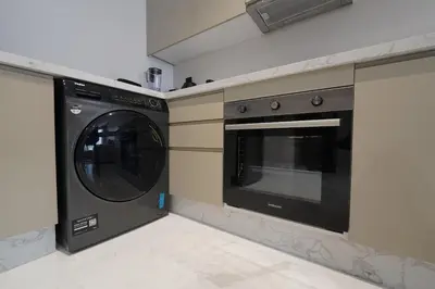 a laundry room with a washer and dryer at Exclusive Apt Casa City Center in Casablanca
