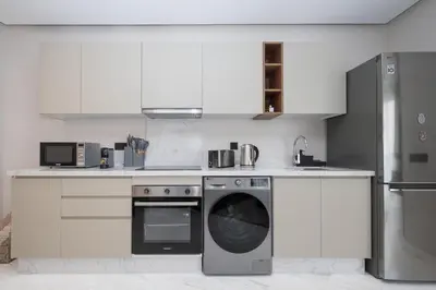 a kitchen with a dishwasher and a washer at Stylish Apt Casa City Center in Casablanca