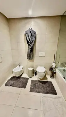 a bathroom with a toilet and a sink at 2 Bedroom Apartment in Casablanca