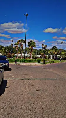 a street with a car parked on the side of a road at Cozy Room with Private Bathroom and Balcony in Casablanca