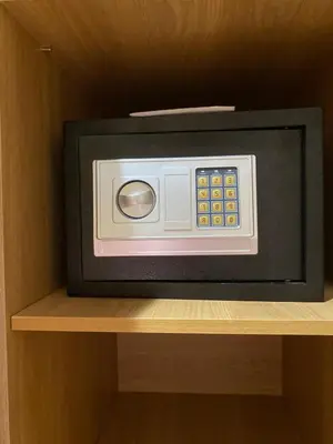 a microwave oven sitting on top of a shelf at Duplex Vue Piscine et Jardin Océan Park à Zenata City Eco in Aïn Harrouda