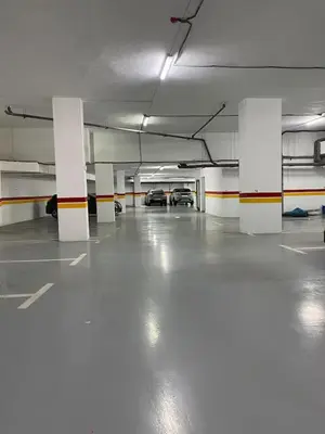 an empty parking garage with cars parked in it at La Corniche - Seaside - Hassan II in Casablanca
